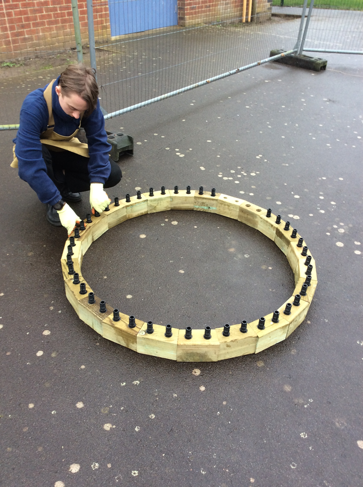 pupil begins erecting the circular bed