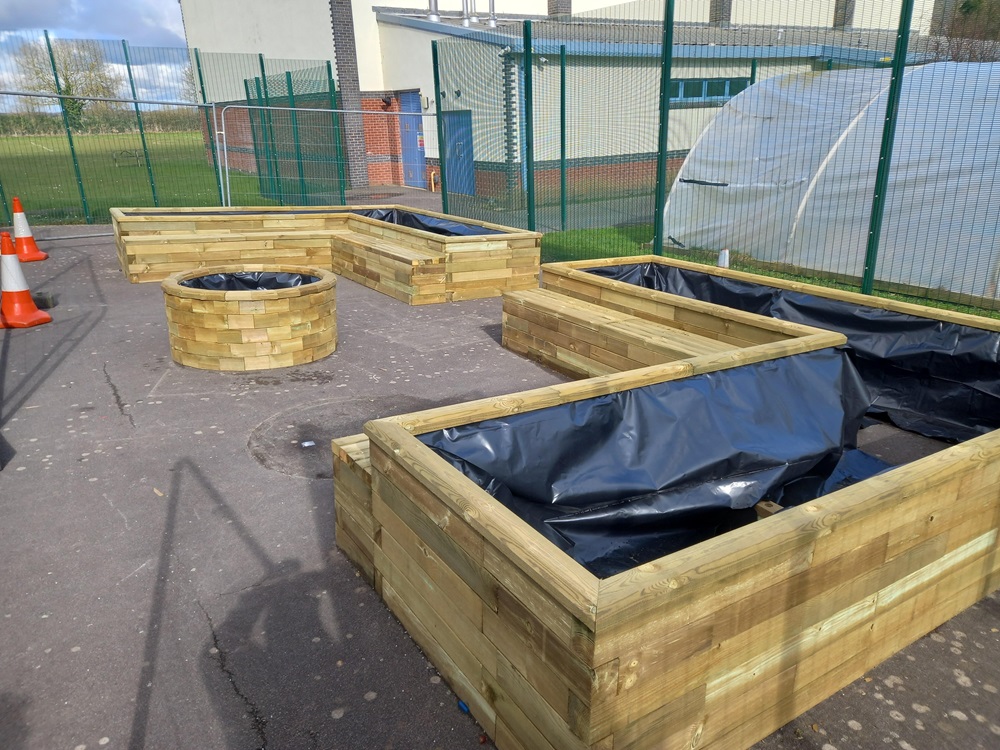 The completed raised planters and new seating areas